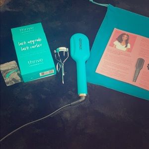 Amika mini straightening brush& Thrive Causemetics